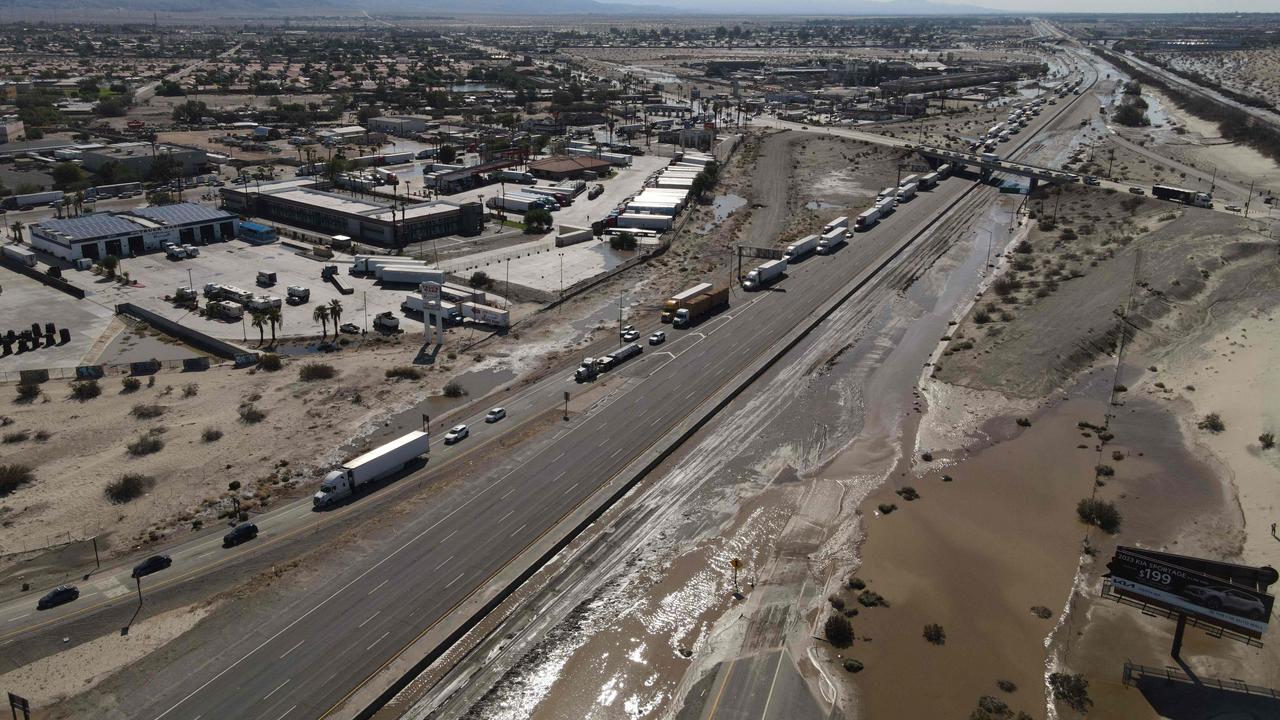 Traffic is diverted on Interstate 10 because flooding and mud crossing the highway at Bob Hope Drive in Rancho Mirage near Palm Springs, California, following TS Hillary. Picture: AFP