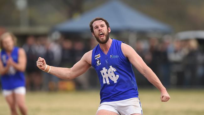 Hastings player Matt Clifford is exultant after nailing a goal in the final quarter goal. Picture: Chris Eastman