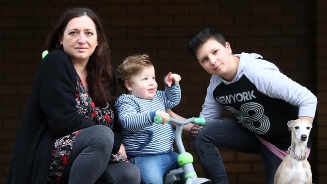 ‘They need to pull this off’: Belarusian migrant Inna Mitelman, in Melbourne with her children Gabriel, 18 months, and Mickey, 12. Picture: Aaron Francis