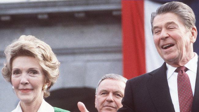 There hasn’t been a landslide win in a US presidential election since Ronald Reagan’s near obliteration of Walter Mondale in 1984. Pictured is former US President Ronald Reagan, right, with his wife Nancy. Picture: AFP