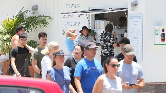 Crowds outside The Nook at Burleigh Heads. Picture: Richard Gosling.