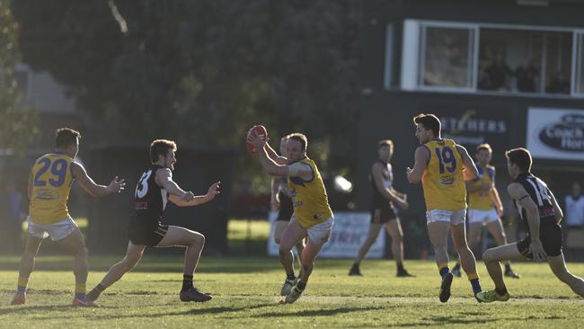 Local football clubs are spending thousands to remain competitive. Picture: Christopher Chan