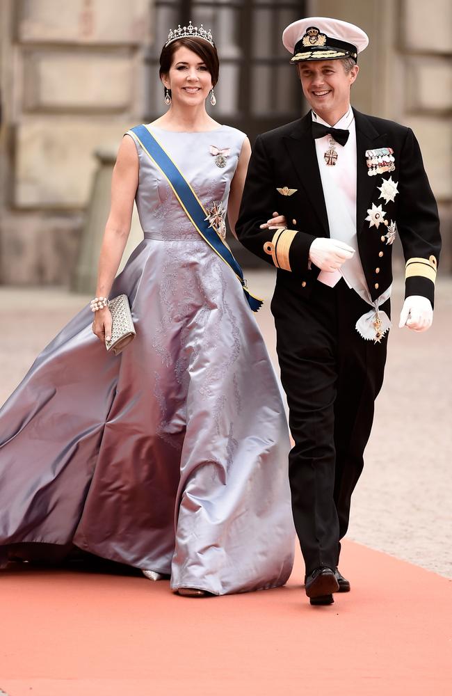 Crown Prince Frederik of Denmark and Crown Princess Mary Of Denmark attend the royal wedding of Prince Carl Philip of Sweden and Sofia Hellqvist at The Royal Palace in 2015.