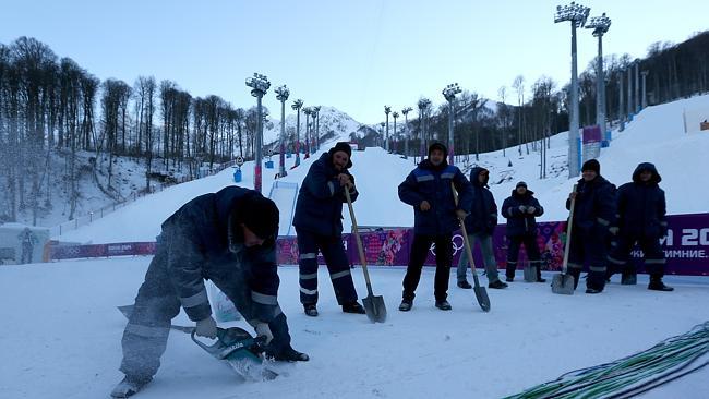 Workers prepare the venue at the Extreme Park at Rosa Khutor Mountain ahead Games.