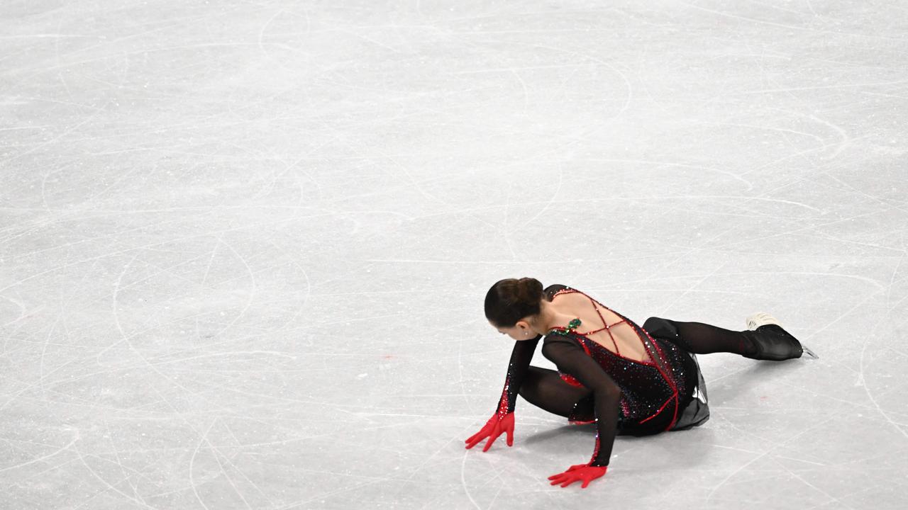 Russia's Kamila Valieva falls as she competes in the women's single skating free skating. (Photo by Kirill KUDRYAVTSEV / AFP)