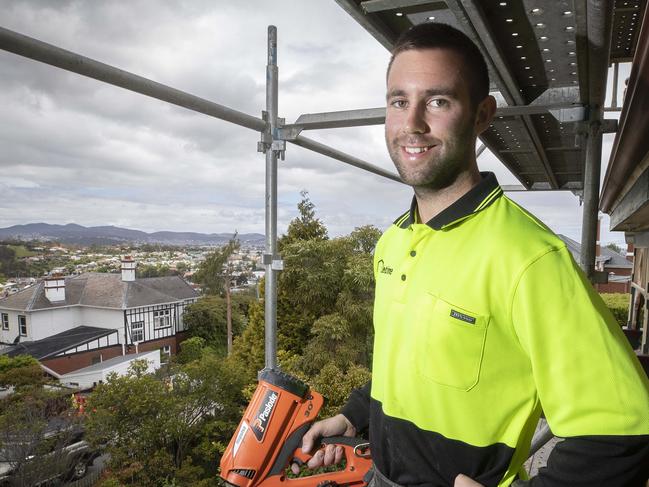 4th year apprentice carpenter Lucas Higgins of Lifetime Homes at work in Mount Stuart. Picture: Chris Kidd