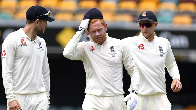 Jonny Bairstow (centre) is comforted by captain Joe Root (right) after the 10-wicket loss.