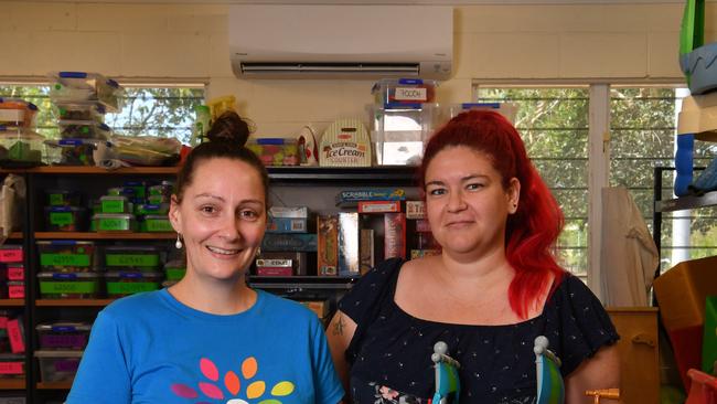 Stacey Prenter and Teele Sullivan with the new aircon at the Townsville Toy Library. Picture: Evan Morgan