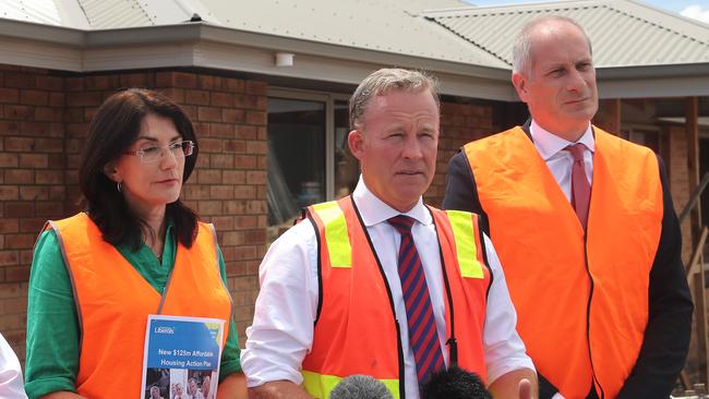 Premier Will Hodgman flanked by Human Services Minister Jacquie Petrusma and Master Builders of Tasmania executive director Michael Kerschbaum. Picture: LUKE BOWDEN