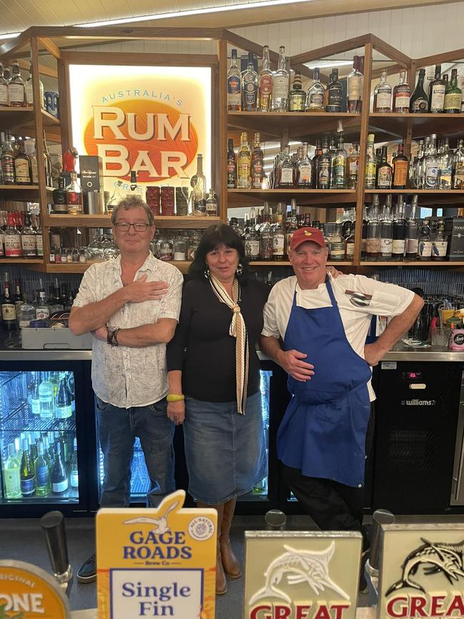 Fish D'Vine owners Mark Whyatt, Rebecca Clark, and Kevin Collins are closing the rum bar and restaurant after 20 years in Airlie Beach. Picture: Contributed