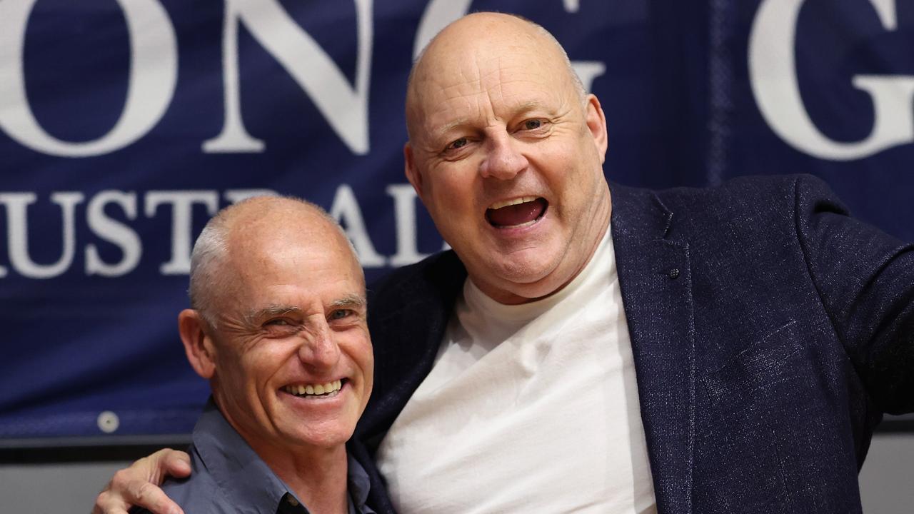 Former Geelong players Billy Brownless and Andrew Bews cheered on United. Picture: Kelly Defina/Getty Images.