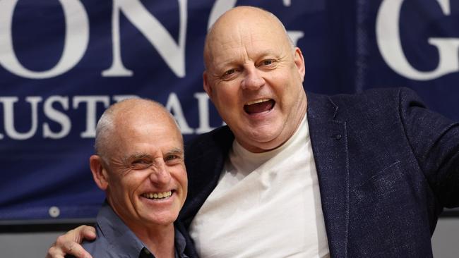 Former Geelong players Billy Brownless and Andrew Bews cheered on United. Picture: Kelly Defina/Getty Images.