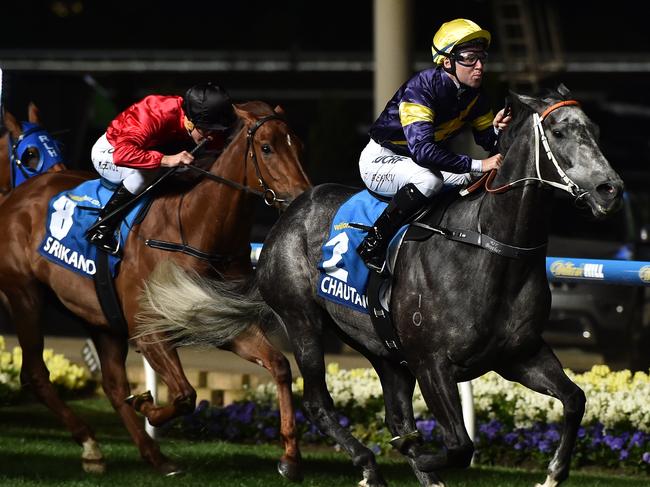 Tommy Berry rides Chautauqua (right) to victory in the Manikato Stakes at Moonee Valley racecourse in Melbourne, Friday, Oct. 23, 2015. (AAP Image/Julian Smith) NO ARCHIVING