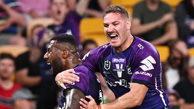 Suliasi Vunivalu and Brenko Lee of the Storm celebrate.