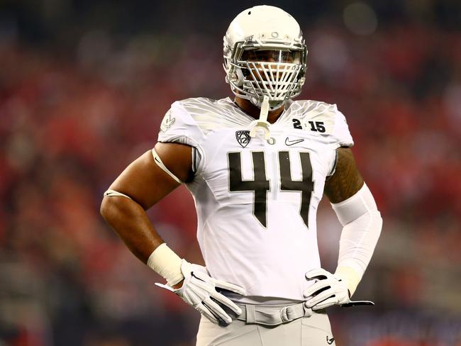 ARLINGTON, TX - JANUARY 12: Defensive lineman DeForest Buckner #44 of the Oregon Ducks looks on in the first half during the College Football Playoff National Championship Game at AT&T Stadium on January 12, 2015 in Arlington, Texas. (Photo by Ronald Martinez/Getty Images)