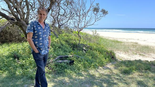 Tim Freedman, pictured at the back of his holiday home in Broken Head, NSW. Picture: Andrew McMillen