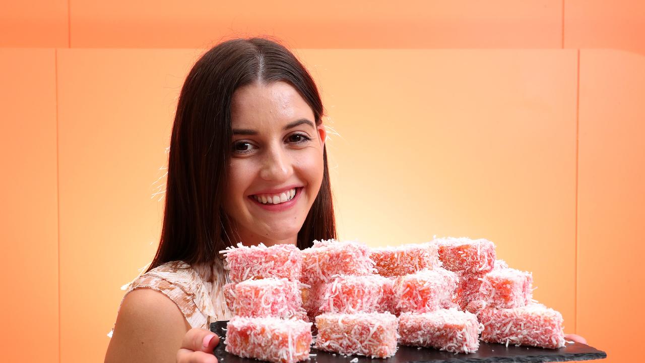 Bianca Cannell with Hibiscus Jammie Lamingtons, part of the high tea of Australia at the W Brisbane. Picture: Liam Kidston