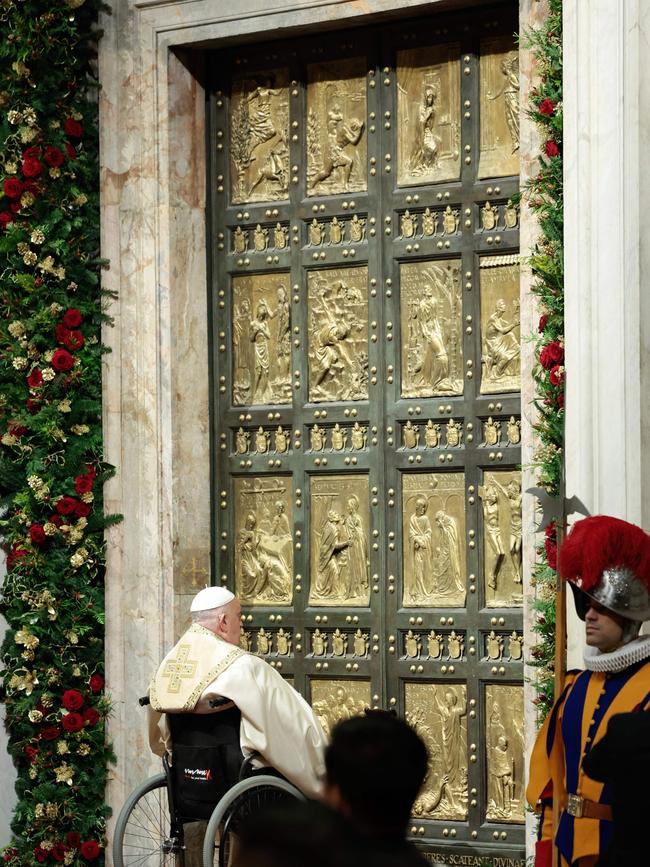 Pope Francis prepares to open the Holy Door of St Peter's Basilica. Picture; AFP.