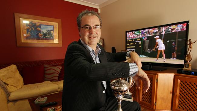 Proud dad Robert Barty with Ash’s trophies just after she won at Wimbledon.