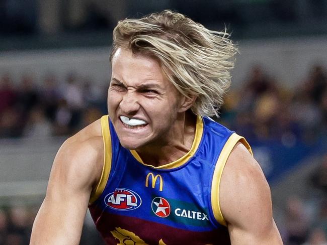 BRISBANE, AUSTRALIA - JUNE 14: Kai Lohmann of the Lions celebrates a goal during the 2024 AFL Round 14 match between the Brisbane Lions and the St Kilda Saints at The Gabba on June 14, 2024 in Brisbane, Australia. (Photo by Russell Freeman/AFL Photos via Getty Images)