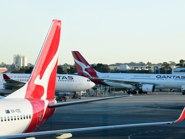 Qantas aircraft are seen on the tarmac at Sydney Airport, Adelaide, Wednesday, May 8, 2019. (AAP Image/Bianca De Marchi) NO ARCHIVING