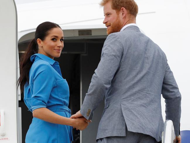 Prince Harry and Meghan leaving from Fua'amotu International Airport, Tonga. Picture: Getty