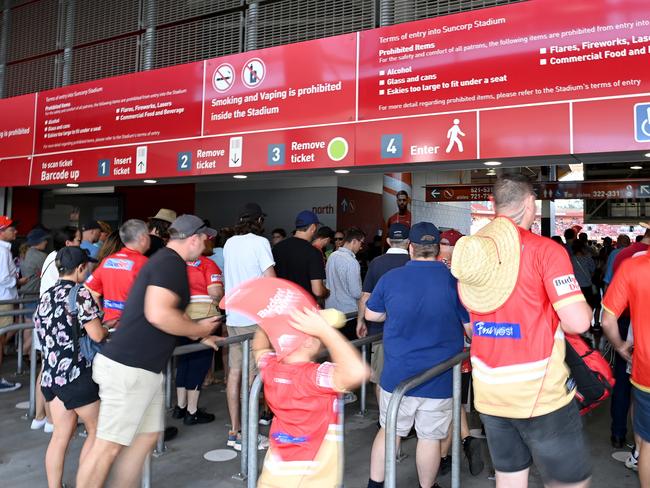BRISBANE, AUSTRALIA - MARCH 05: Dolphins fans enter the stadium before the round one NRL match between the Dolphins and Sydney Roosters at Suncorp Stadium on March 05, 2023 in Brisbane, Australia. (Photo by Bradley Kanaris/Getty Images)