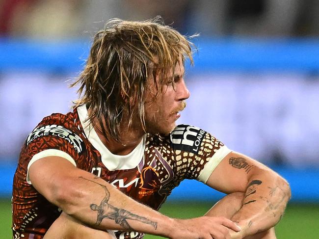 BRISBANE, AUSTRALIA - JULY 13: Blake Mozer of the Broncos looks dejected after his team's defeat during the round 19 NRL match between Brisbane Broncos and St George Illawarra Dragons at Suncorp Stadium, on July 13, 2024, in Brisbane, Australia. (Photo by Albert Perez/Getty Images)