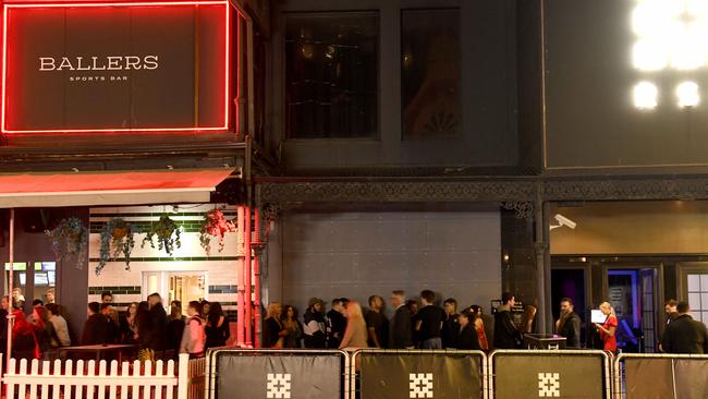 A queue for Red Square on Hindley Street in July. Picture: Naomi Jellicoe