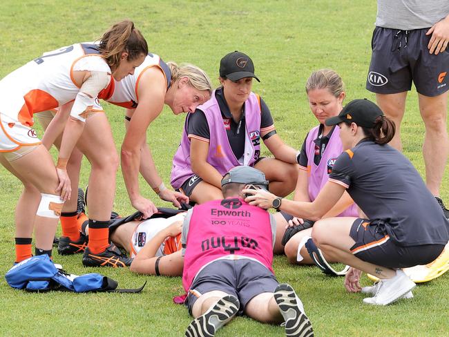 Giants medicos attend to Brid Stack after she was injured in an on-field collision. Picture: Getty Images