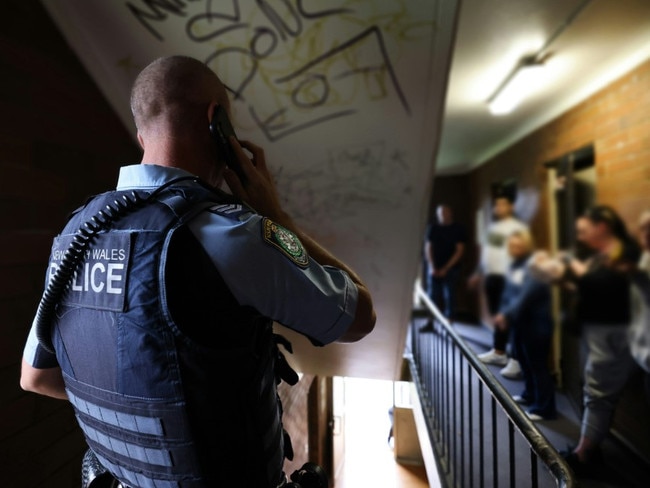 Police searching an apartment block in Sydney during the blitz: Picture: NSW Police