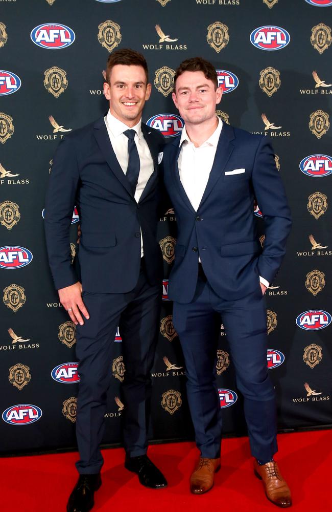 Jarryd Lyons with Lachie Neale in Brisbane. Picture: Steve Pohlner