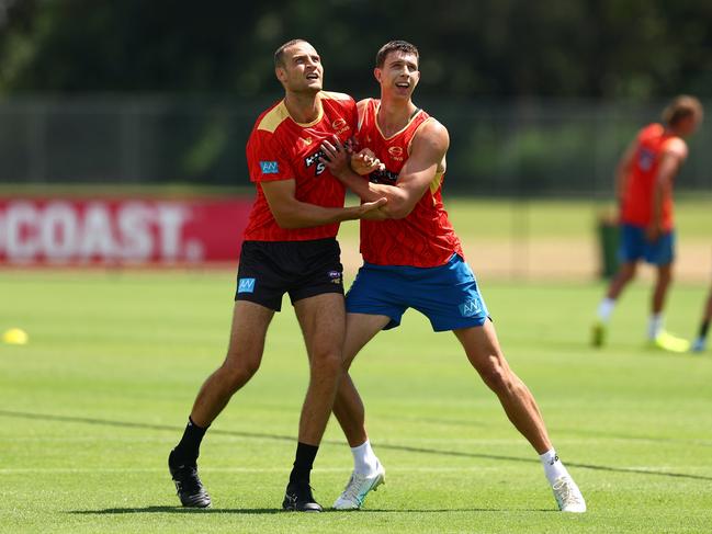 GOLD COAST, AUSTRALIA - NOVEMBER 25: Jarrod Witts and Max Knobel during a Gold Coast Suns AFL training session at Austworld Centre Oval on November 25, 2024 in Gold Coast, Australia. (Photo by Chris Hyde/Getty Images)