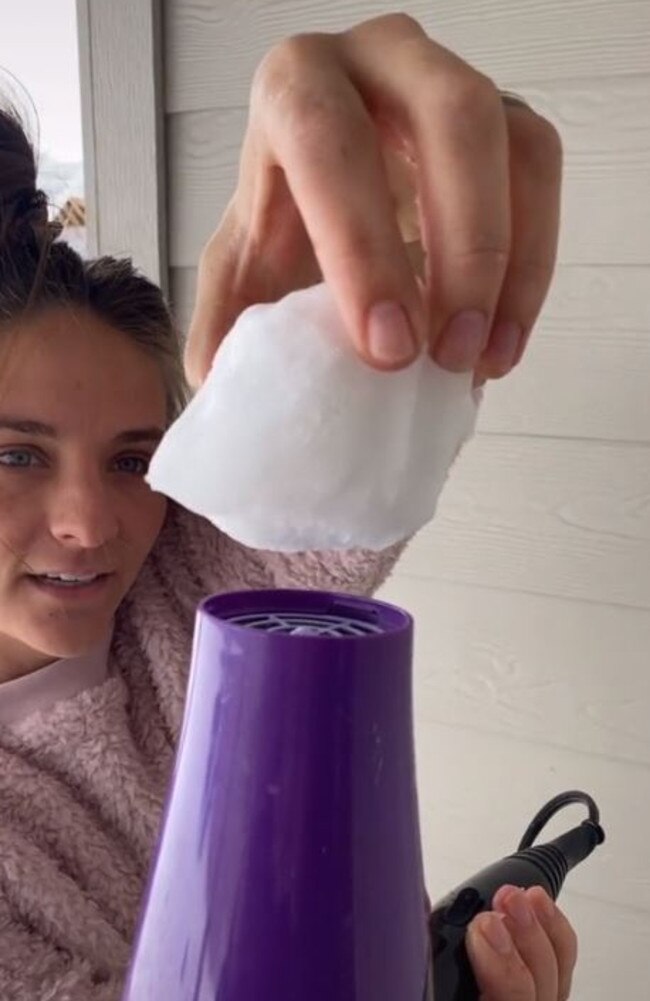 A TikTok user said snow was 'not melting' as she held it over her hair dryer.