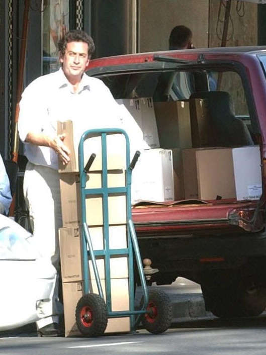 Andrew Garrett unloads cases for The Office bar in Pirie Street. Picture: File