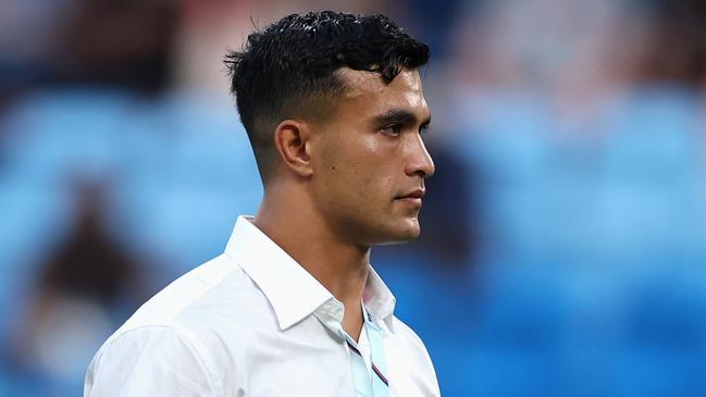 SYDNEY, AUSTRALIA - FEBRUARY 28: Injured Waratah player Joseph Suaalii watches team mates warm up during the round three Super Rugby Pacific match between NSW Waratahs and Fijian Drua at Allianz Stadium, on February 28, 2025, in Sydney, Australia. (Photo by Cameron Spencer/Getty Images)