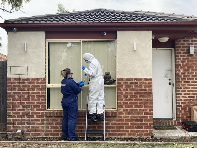 Forensice investigators at the scene in Melton.