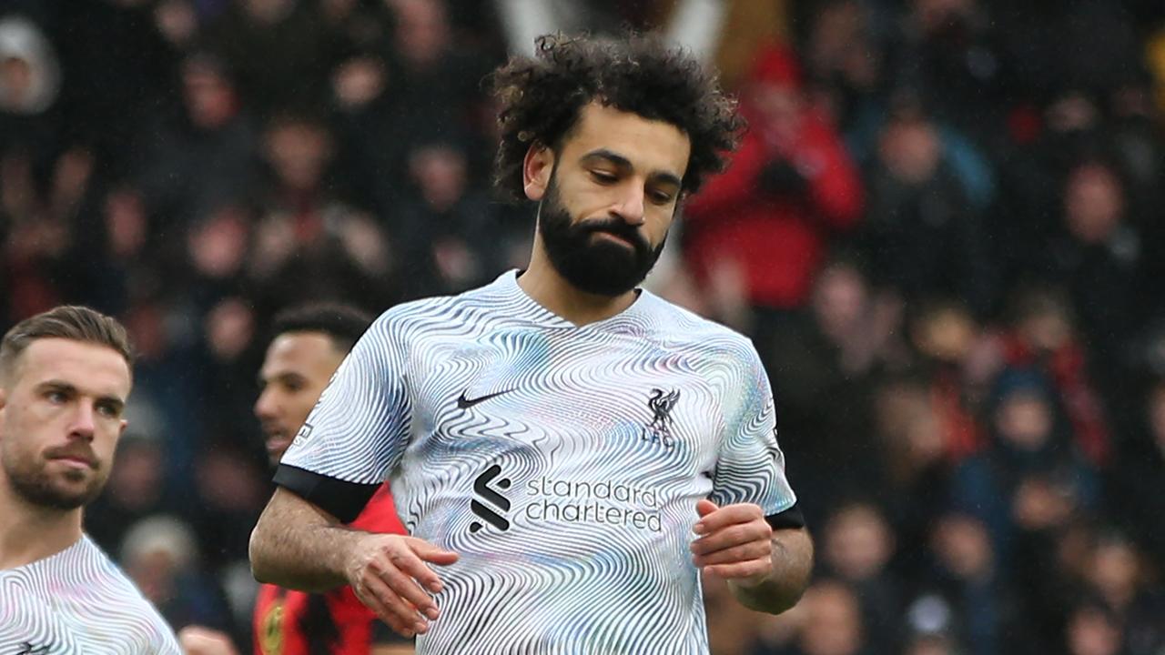 Liverpool's Egyptian striker Mohamed Salah reacts after missing his penalty kick during the English Premier League football match between Bournemouth and Liverpool at the Vitality Stadium in Bournemouth, southern England on March 11, 2023. (Photo by Steve Bardens / AFP) / RESTRICTED TO EDITORIAL USE. No use with unauthorized audio, video, data, fixture lists, club/league logos or 'live' services. Online in-match use limited to 120 images. An additional 40 images may be used in extra time. No video emulation. Social media in-match use limited to 120 images. An additional 40 images may be used in extra time. No use in betting publications, games or single club/league/player publications. /