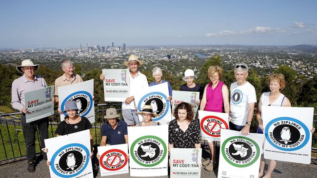 Ross Kapitzke, John Griffiths, Graham Evans, Rachel Griffiths, Jan Keay, Debra Shimada, Alan Lee, Bron Raftery, Maria Miller, Peter Hale, Jules Moreton and Emma Markwell at the Mt Coot-tha Summit. Picture: AAP/Josh Woning