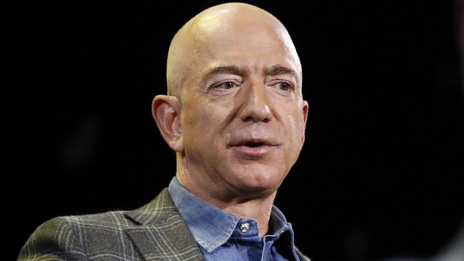 Amazon, the company founded by billionaire Jeff Bezos - seems to be doing little to curb fraudsters and scammers operating on their platform. Picture: AP/John Locher