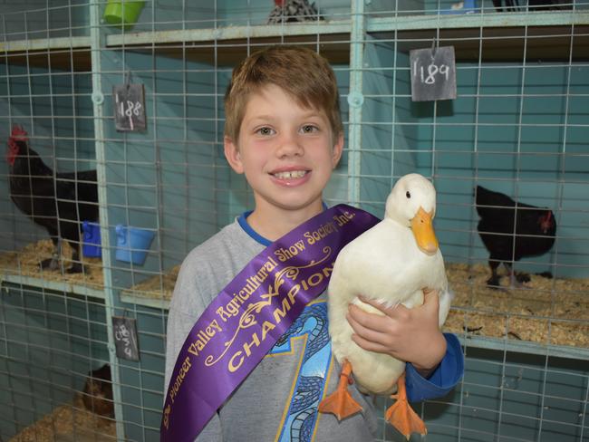 Eight-year-old Charlie Turner from Walkerston State School with his prize-winning duck at the Pioneer Valley Show 2021. Picture: Lillian Watkins