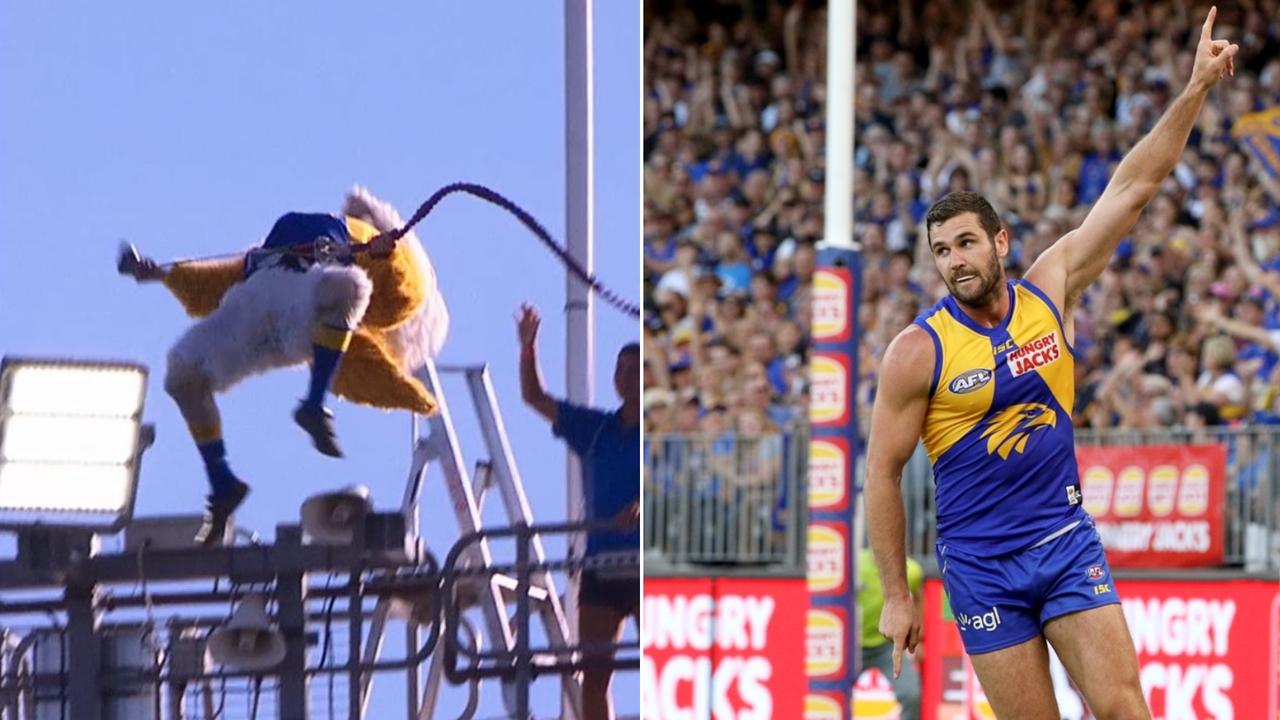 The Eagles unfurled their premiership flag in perfect style: Via a backflip and a big win over the Giants.