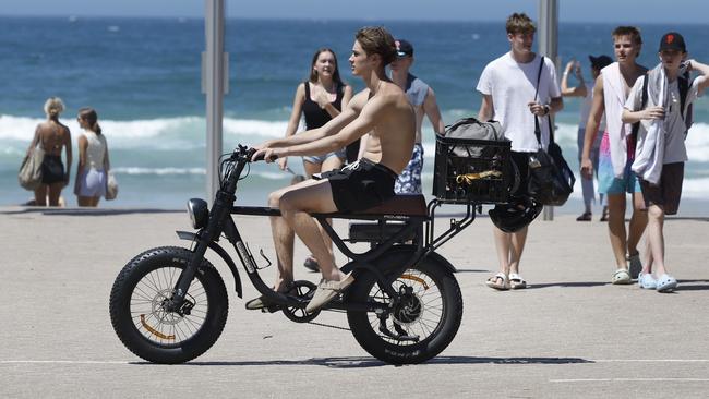 DAILY  TELEGRAPH 28TH JANUARY 2025Pictured in Manly is a young person using the hugely popular DiroDi Rover E- Bike. The community is split on issues about where the bike is ridden.Picture: Richard Dobson