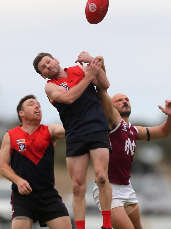 Wycheproof-Narraport’s Justin Bateson attempts a mark.