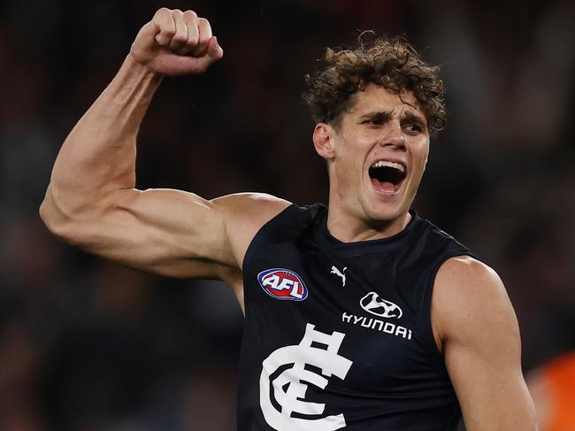 MELBOURNE, AUSTRALIA - August 27 , 2023. AFL .   Charlie Curnow of the Blues celebrates his 1st goal of the day, his 75th of the year, drawing him level with Taylor walker in the 2023 Coleman medal race during the round 24 match between Carlton and the Greater Western Sydney Giants at Marvel Stadium in Melbourne, Australia.  Photo by Michael Klein.