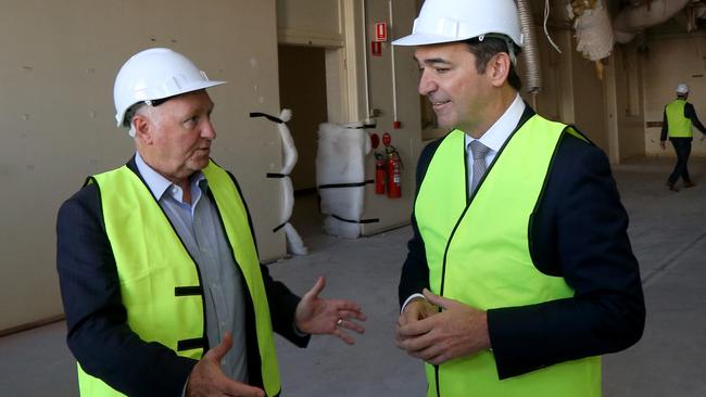 Premier Steven Marshall (right) speaks with John Hanlon when he was chief executive of Renewal SA during a tour of the Old Royal Adelaide Hospital in 2018. Picture: Kelly Barnes