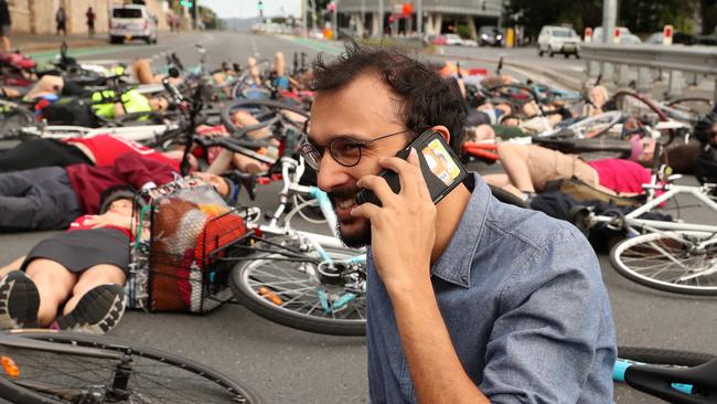 Controversial "Die in" cyclist protest led by Councillor Johnathan Sri during peak hour traffic at the corner of Vulture and Graham Streets, South Brisbane. Photographer: Liam Kidston