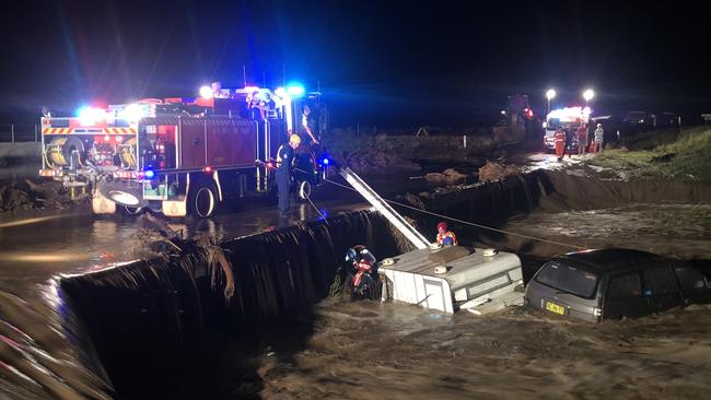 The car and trailer washed off a flooded causeway. Picture: Supplied