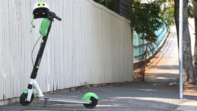 Lime Scooters have been seen abandoned around Brisbane. Picture: AAP/John Gass