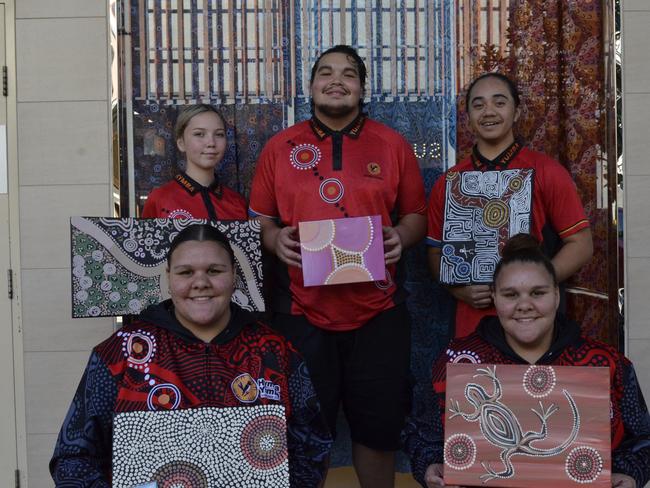 Hymba Yumba artists (clockwise from back left) Jamelia Maybanks, Jerimiah Wylie-Coolwell, Talen Bourne, andJanaya and Jinali Fox (front).